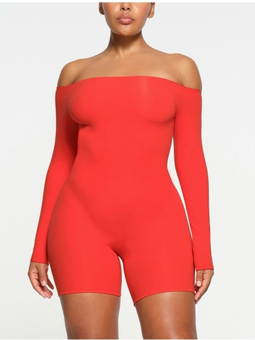 SKIMS Off-Shoulder Long Sleeve Bodysuit Romper in Ruby